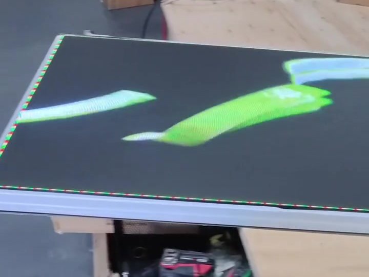 LED display panels being bench tested before a restaurant install