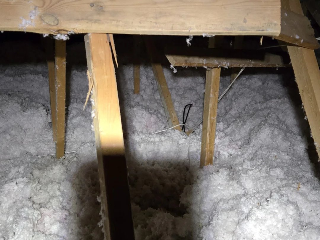 Camera cable run through the attic of a Richmond Hill home